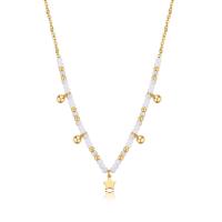 Collana dorata serie Glint con sfere bianche e stella